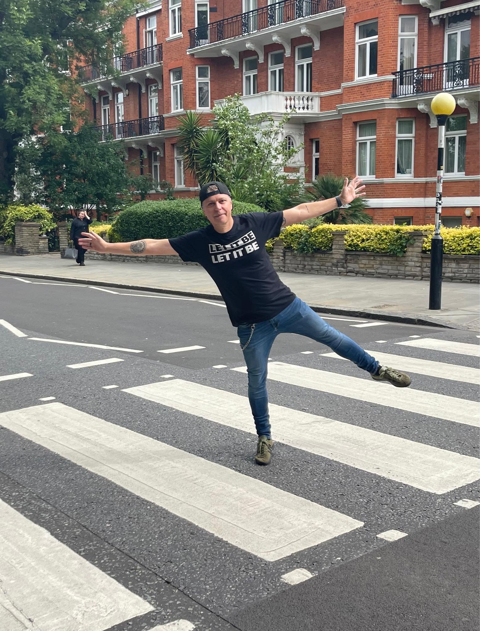 Damien recreating the Abbey Road crossing in London