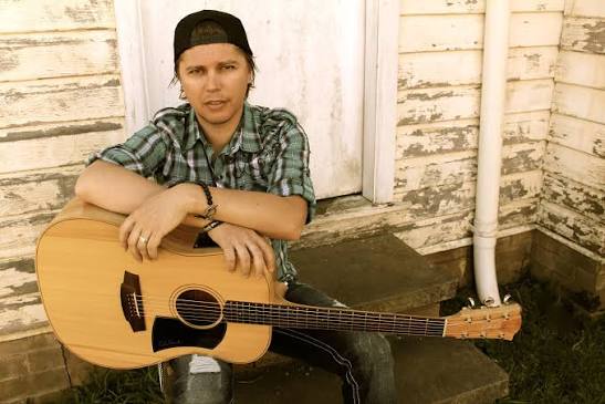 Damien with guitar